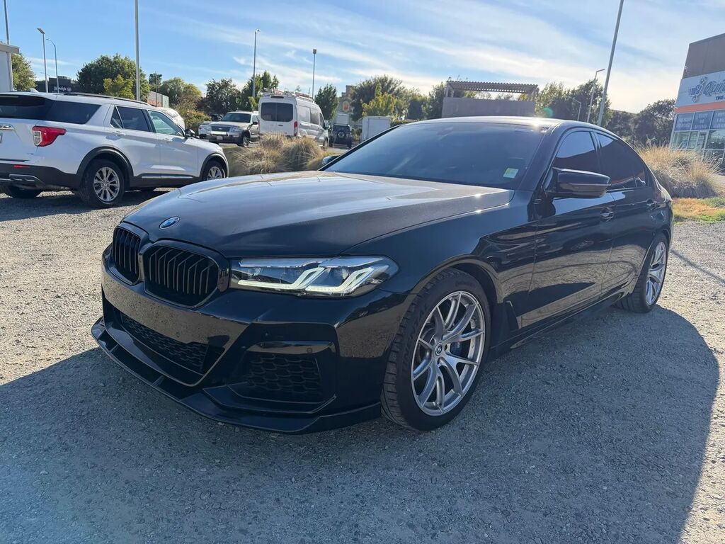 2023 BMW 5 Series M550i xDrive — photo 1 of 52